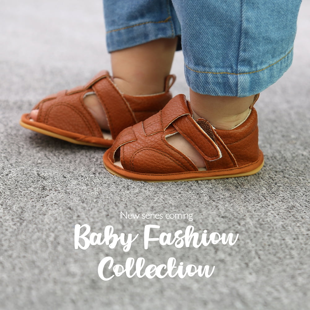 First Steps Baby Leather Sandals - Lifestyle Shot with Baby Wearing Tan Sandals and Jeans