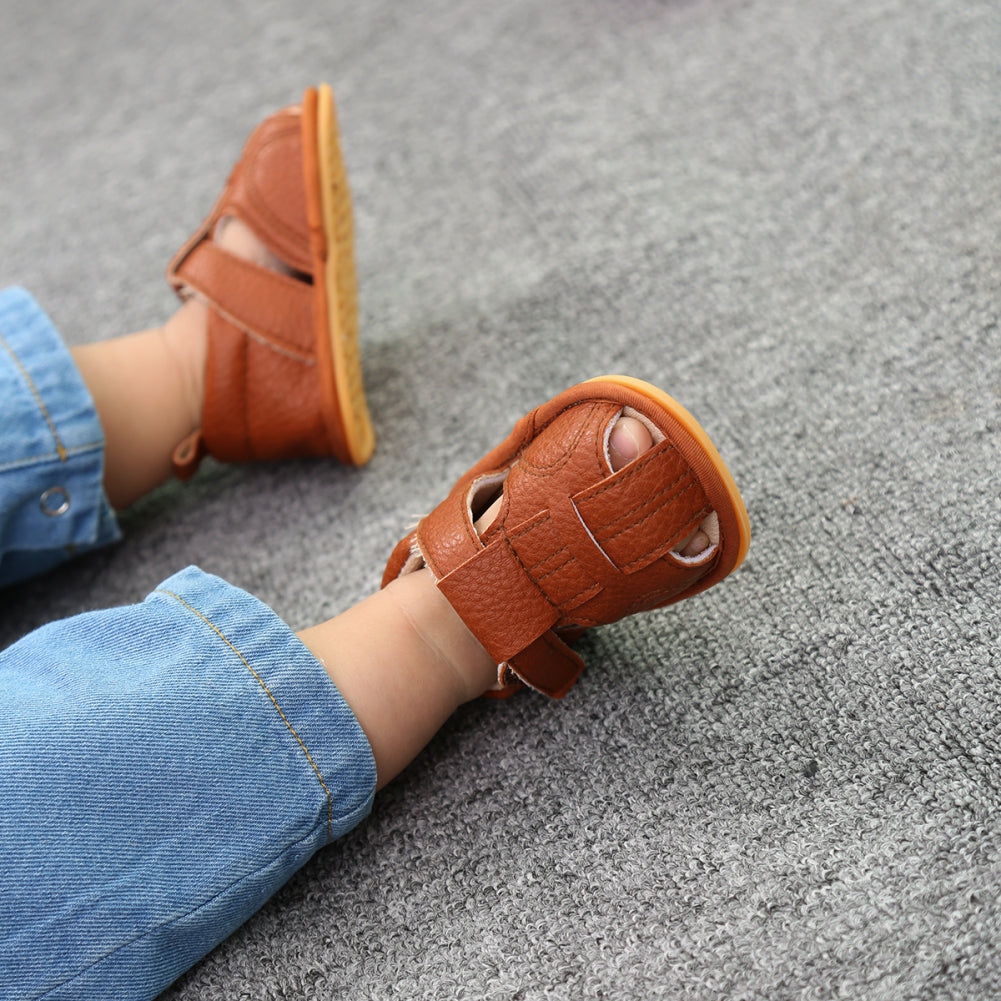 First Steps Baby Leather Sandals - Lifestyle Shot Showing Anti-Slip Rubber Sole