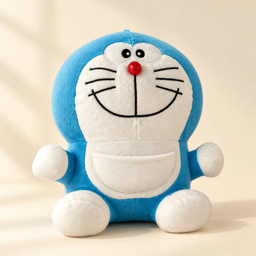 Smiling blue-and-white cat plush in a softly lit studio setting