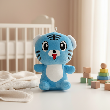 Blue cartoon tiger plush doll – cozy nursery scene on white table next to white crib with wooden blocks and stacker
