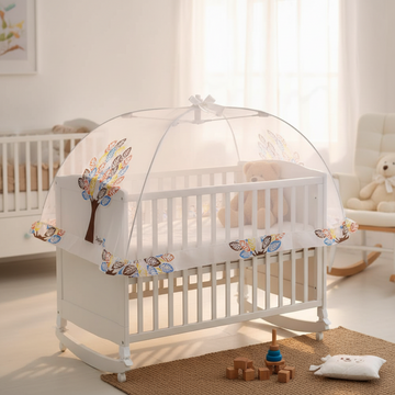 Foldable baby crib mosquito net – cozy nursery scene installed over white baby crib showing full coverage with colorful tree border print