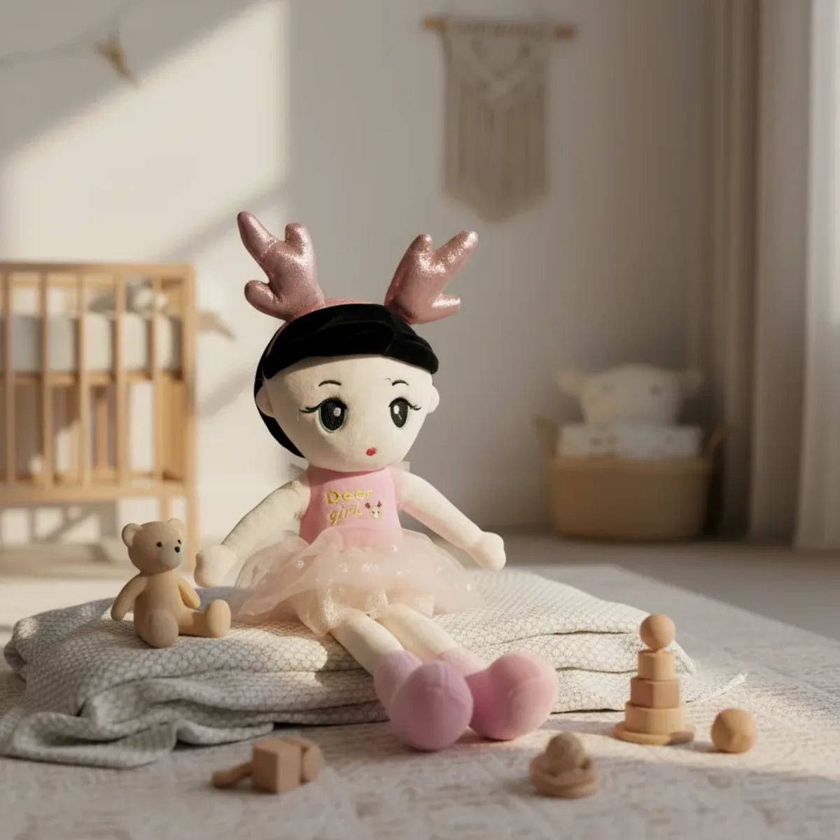 Fawn the Deer Ballerina doll sitting in a boho nursery with wooden toys