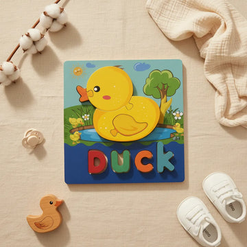 3D Wooden Word Puzzle Duck design showing bright yellow duck puzzle over sunny pond scene board with D-U-C-K letter tiles on linen background with wooden duck toy and white sneakers