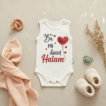 Buradasın Halam White Sleeveless Baby Bodysuit - lifestyle flat lay on beige linen with wooden ring teether cream knit baby shoes mint pacifier and dried pampas grass with pink muslin cloth