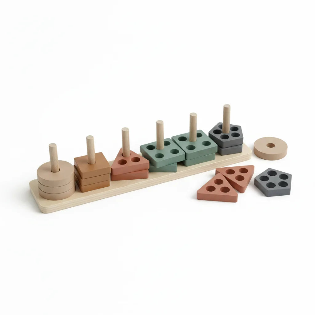 Montessori geometric shape sorter stacker 5 peg wooden base board with sand circle terracotta square rust triangle sage green rectangle and slate grey pentagon shapes on white background with loose pieces beside board