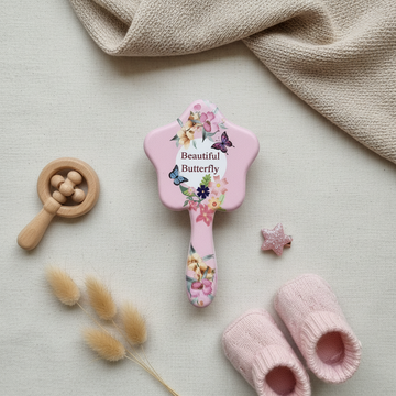 Beautiful Butterfly hair brush and mirror gift set – premium flat lay on cream linen showing both pieces with baby shoes and dried flowers