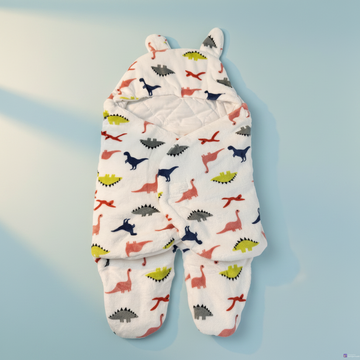 Dinosaur print baby sleeping bag – premium studio scene showing full dino print and 3D ears