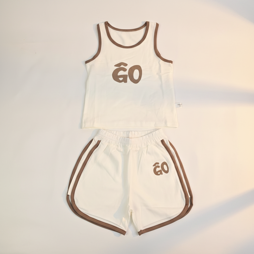 GO Kids Sporty Baby Tank Top Shorts Set - premium studio scene flat lay white background showing tank and shorts side by side with natural shadow