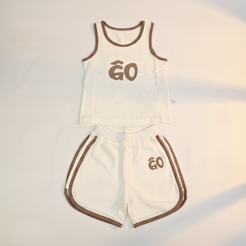 GO Kids Sporty Baby Tank Top Shorts Set - premium studio scene flat lay white background showing tank and shorts side by side with natural shadow