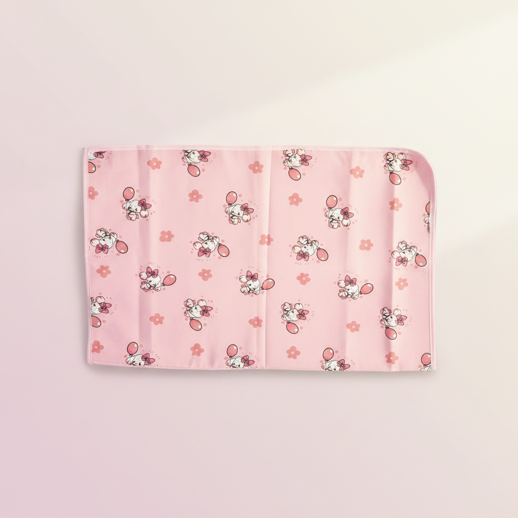 Pink Puppy Balloon Waterproof Baby Changing Mat - premium studio scene top view on light pink background showing full print and rounded corners
