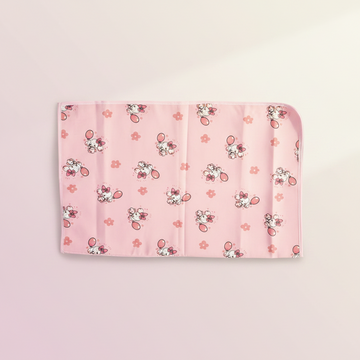 Pink Puppy Balloon Waterproof Baby Changing Mat - premium studio scene top view on light pink background showing full print and rounded corners