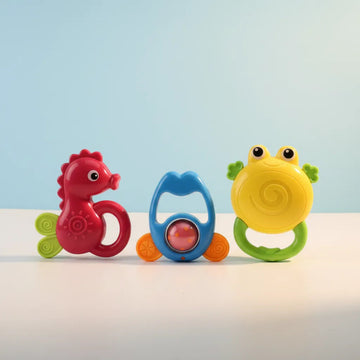 Ocean Friends Baby Rattle Set studio shot of three rattles standing upright on light blue background