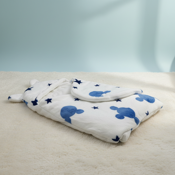 Mickey Mouse print baby swaddle wrap – premium studio scene folded flat on cream surface with matching round pillow showing full Mickey stars print