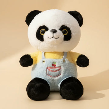 Bao the Dressed Panda plush toy studio shot showing yellow top and blue denim dungarees with cherry pocket